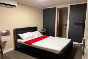 Postelja oz. postelje v sobi nastanitve Remedios Hotel