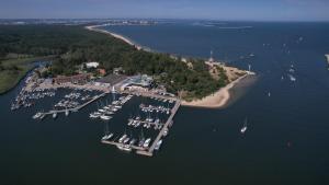 an aerial view of a marina with boats in the water at Hotel Galion in Gdańsk