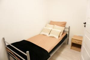 Krevet ili kreveti u jedinici u objektu Nowoczesny Apartament Prudnik