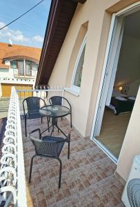 Balkón alebo terasa v ubytovaní Enci Apartman