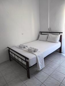 Postel nebo postele na pokoji v ubytování Galini Apartments