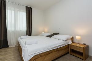 Postel nebo postele na pokoji v ubytování VILLA PETAR'S DREAM 3