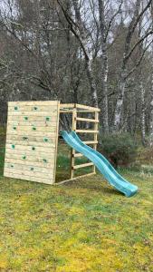 Herní místnost nebo prostor pro děti v ubytování Drumguish Cottage
