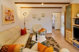 Μια τηλεόραση ή/και κέντρο ψυχαγωγίας στο Ferienhaus Gerken Amselnest +14 φωτογραφίες