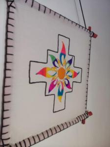 a drawing of a flower on a notebook at Retama in Tilcara