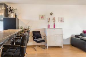 a living room with two chairs and a table at Lampl Haus 