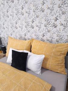 Posteľ alebo postele v izbe v ubytovaní Várfal apartman