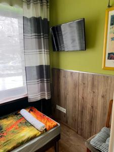 Telewizja i/lub zestaw kina domowego w obiekcie Ratuszowa Noclegi