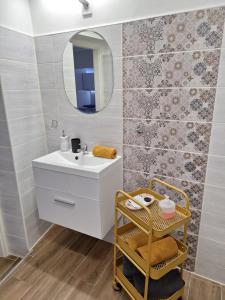 Kúpeľňa v ubytovaní Várfal apartman