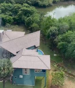 an aerial view of a house with a roof at Wild Ele 243 Wilpattu in Achchamulai