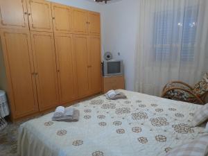 Una cama o camas en una habitación de Soba Tom