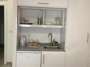 Cuisine ou kitchenette dans l'établissement Casa da Moagem