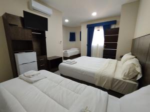 Letto o letti in una camera di Hotel Villa