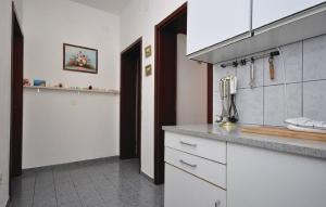 Kuchyňa alebo kuchynka v ubytovaní Apartments Medusa