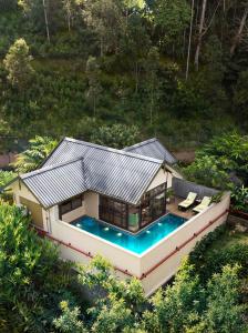 Bazén v ubytování Scenic, Munnar - IHCL SeleQtions nebo v jeho okolí