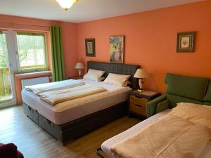 Кровать или кровати в номере Hotel Kienberger Hof