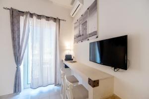 TV a/nebo společenská místnost v ubytování B&B Camera a Sud Mare'