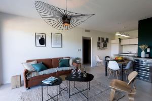 A seating area at Le Gaston - Appartement vue dégagée Porto Vecchio