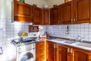 Kuchyň nebo kuchyňský kout v ubytování Casa Gigina