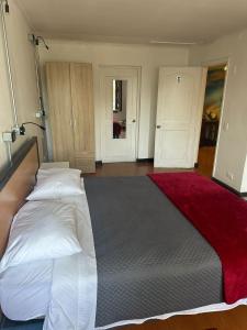 Una cama o camas en una habitación de Enjoy Hostel