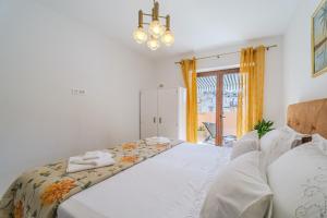 Giường trong phòng chung tại House Benbello +26 ảnh