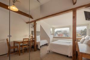 Postel nebo postele na pokoji v ubytování Pytloun Wellness Travel Hotel + 37 fotografií