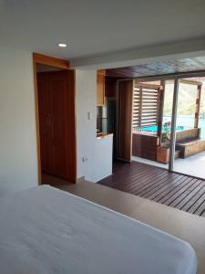 Ένα ή περισσότερα κρεβάτια σε δωμάτιο στο Cabaña El Amanecer de Annapurna