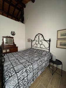 Postel nebo postele na pokoji v ubytování Agriturismo La Vergheria