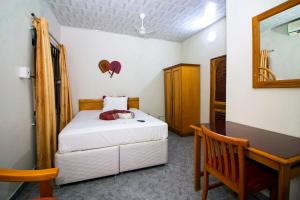 PRESTIGE Guesthouse ,Ksi客房内的一张或多张床位
