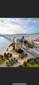 an aerial view of a city and the ocean at Premium Apartment 90m2 in Thessaloniki