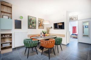 a dining room with a table and chairs at Backstage Loft in Budapest