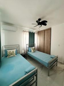 Postel nebo postele na pokoji v ubytování Villa Juana near Downtown in Punta Cana