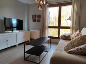 TV a/nebo společenská místnost v ubytování Boira, ideal familias, preciosas vistas, garaje incluido