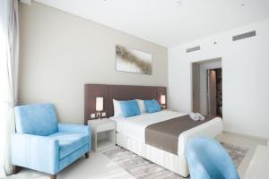 Кровать или кровати в номере Modern 1 bedroom at Palm Jumeirah +11 фотографий