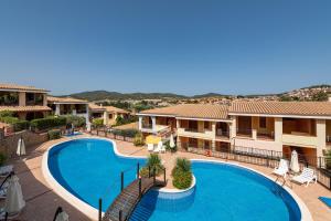 a view of a swimming pool at a resort at Residenza del Sole 1 in Villasimius