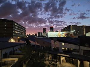 a view of a city skyline with buildings at Trendy apartments _ @ Craftsmanship on main in Johannesburg