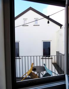 TV a/nebo společenská místnost v ubytování Tric Trac Hostel