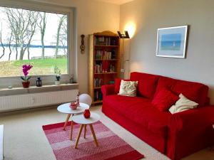 Ein Sitzbereich in der Unterkunft Ferienwohnung Leuchtturm 21