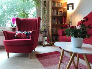 Ein Sitzbereich in der Unterkunft Ferienwohnung Leuchtturm 21