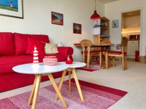 Ein Sitzbereich in der Unterkunft Ferienwohnung Leuchtturm 21