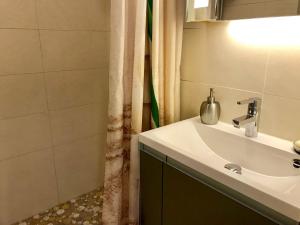Ein Badezimmer in der Unterkunft Ferienwohnung Leuchtturm 21