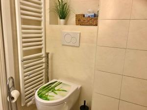 Ein Badezimmer in der Unterkunft Ferienwohnung Leuchtturm 21