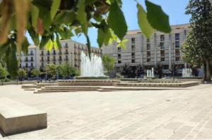 a large building with a fountain in front of it at Spazio Relax B&B in Bellizzi Irpino