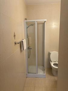 a bathroom with a shower and a toilet at PALLINIO COURT 402 Fig Tree Bay- Protaras Beach, IASONOS STR 7A in Protaras