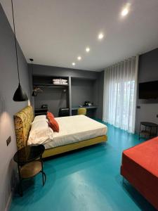 Postel nebo postele na pokoji v ubytování Sorrento Rooms Deluxe