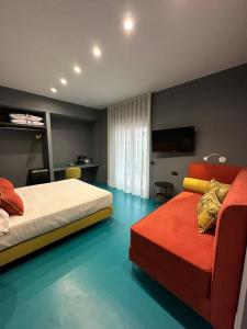 Postel nebo postele na pokoji v ubytování Sorrento Rooms Deluxe