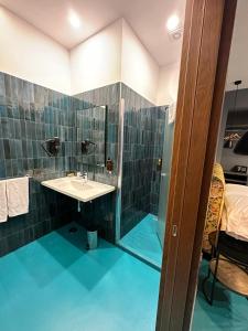 Kylpyhuone majoituspaikassa Sorrento Rooms Deluxe