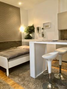 Posteľ alebo postele v izbe v ubytovaní Diamond Apartman