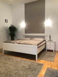 Posteľ alebo postele v izbe v ubytovaní Diamond Apartman