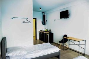 TV a/nebo společenská místnost v ubytování Orange Tree Hotel